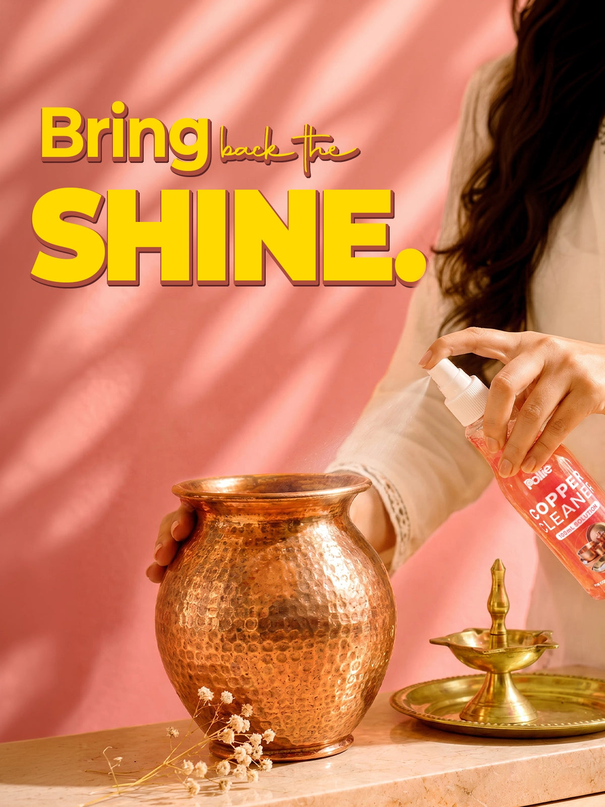 Pollie Copper Cleaner spray bottle for copper and brass utensils, tarnish removal and shine restoration.