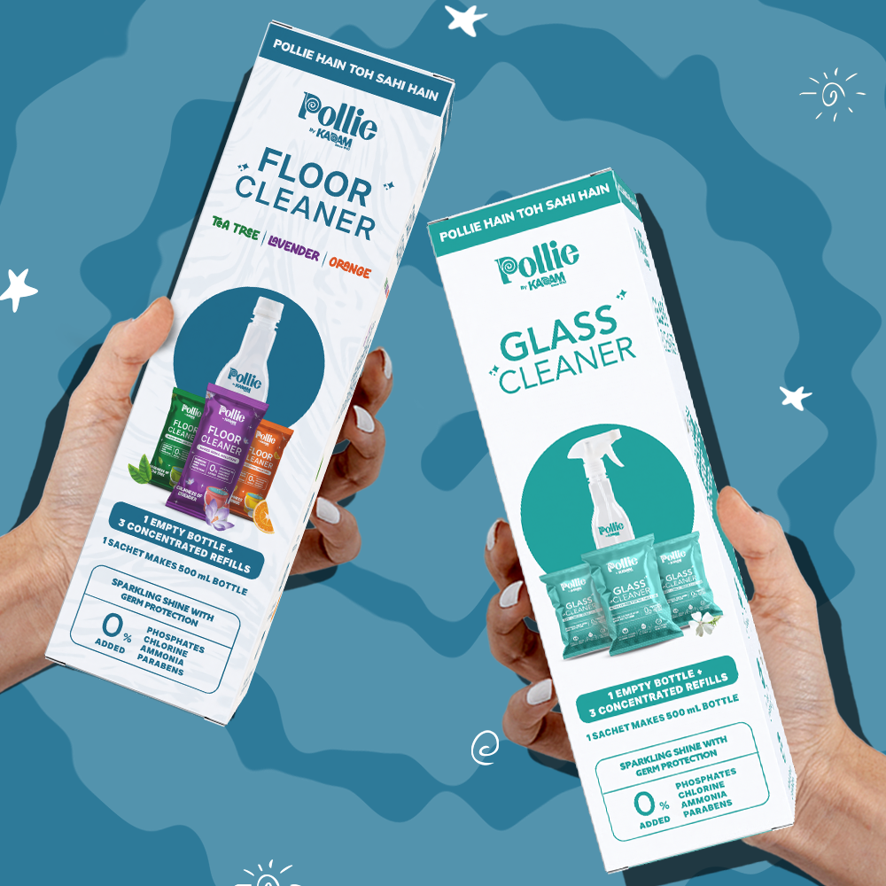 Hands holding Pollie Floor Cleaner and Glass Cleaner combo packs — sustainable refills with germ protection and zero harmful chemicals.