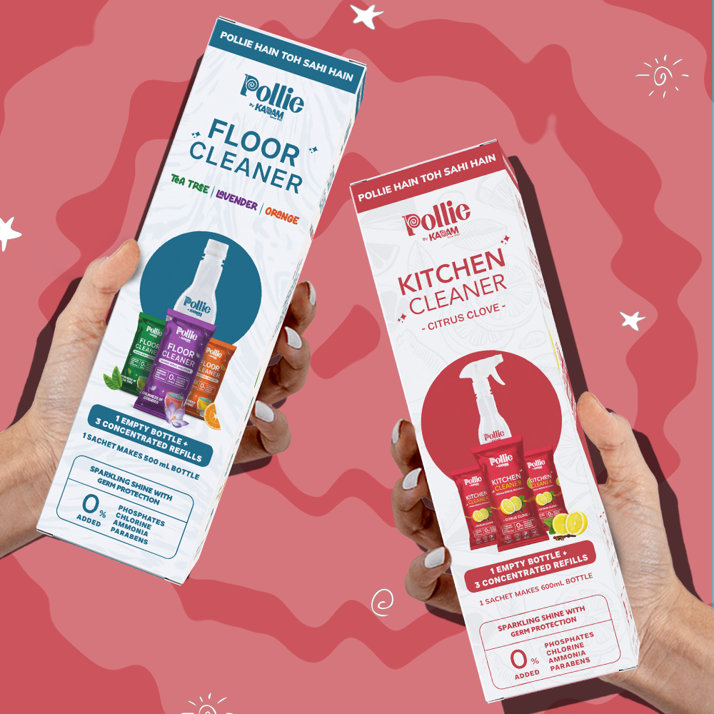 Hands holding Pollie Floor Cleaner and Kitchen Cleaner combo boxes — eco-friendly concentrated refills that reduce plastic waste.
