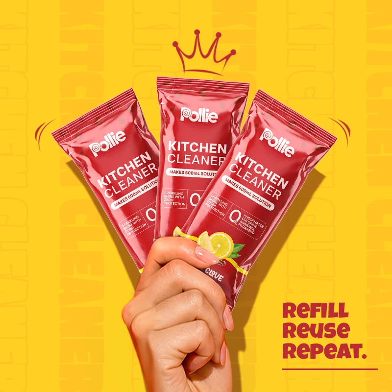 Pollie Kitchen Cleaner Citrus Clove sachet with strong arm graphics — symbolizing powerful grease-removal and germ-killing strength.